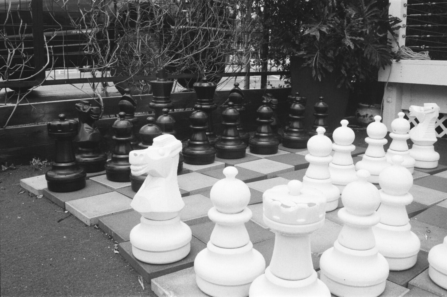 An oversized outdoor chess set